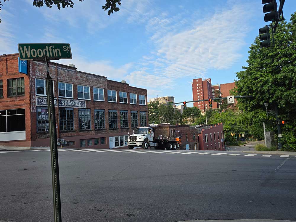A delivery truck at the Intersection of Woodfin Street and Broadway Street in Downtown Asheville