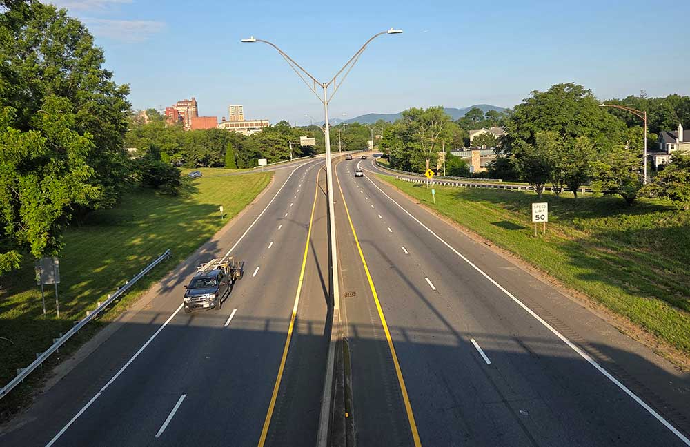 A pickup pulling a trailer on I-240 in Asheville